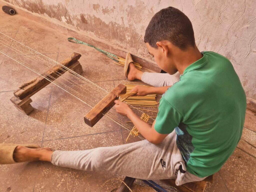Basket weaving workshop at the oasis near Essaouira