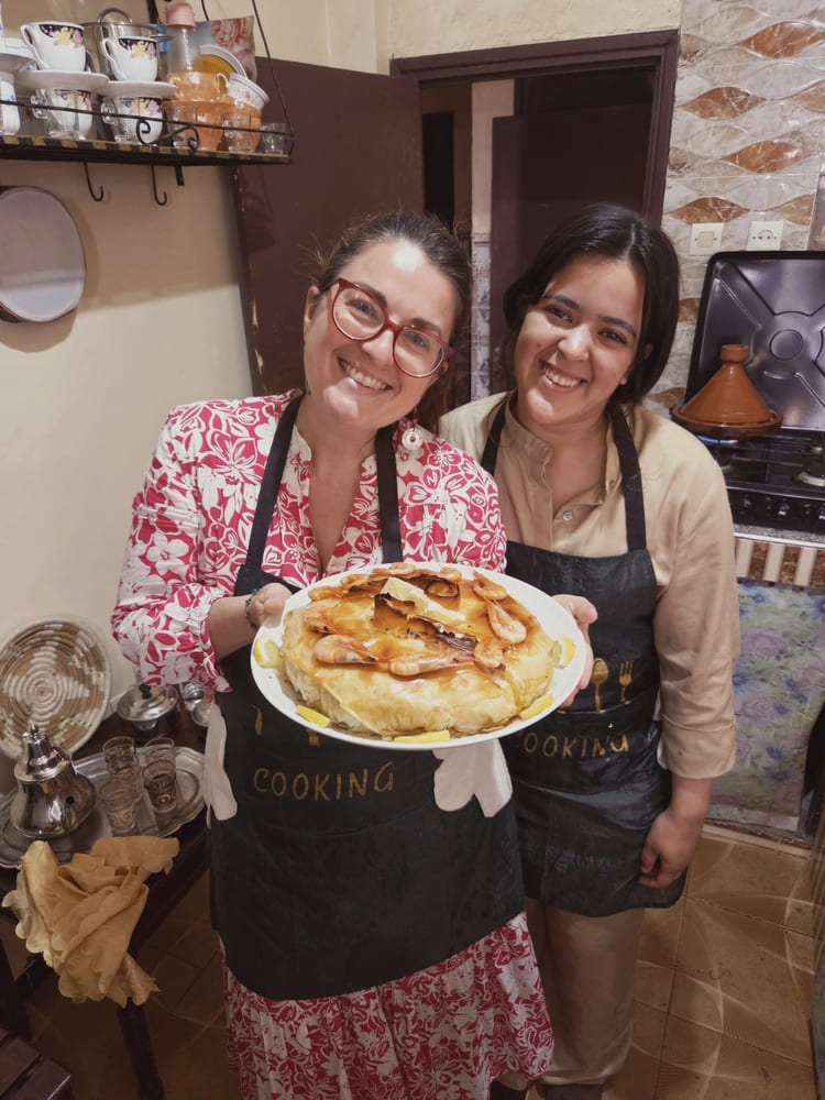 Présentation du plat final réalisé par les participantes au cours de cuisine Agadir